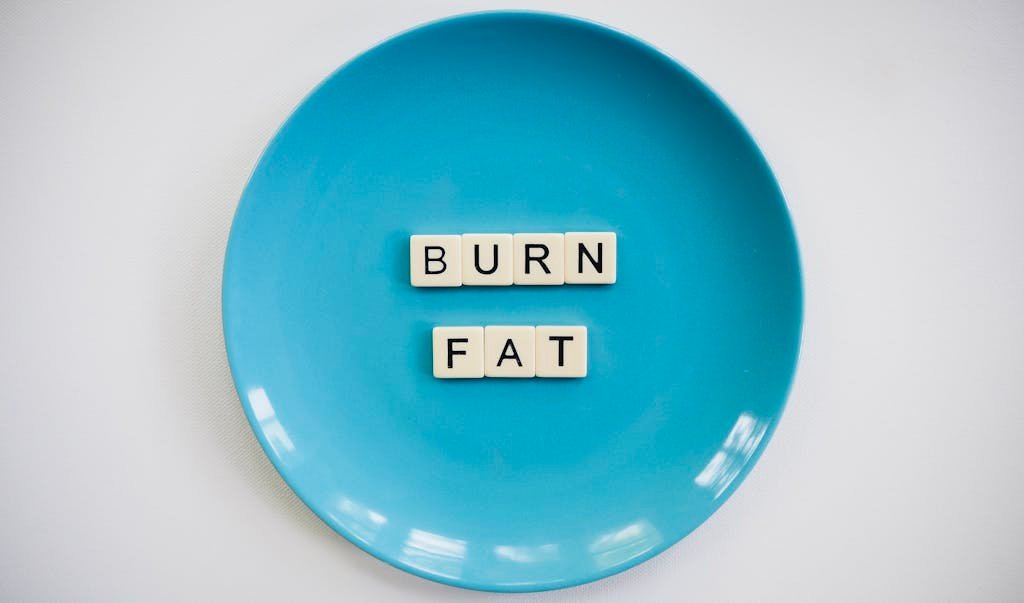 Photo of a Burn Fat Text on Round Blue Plate