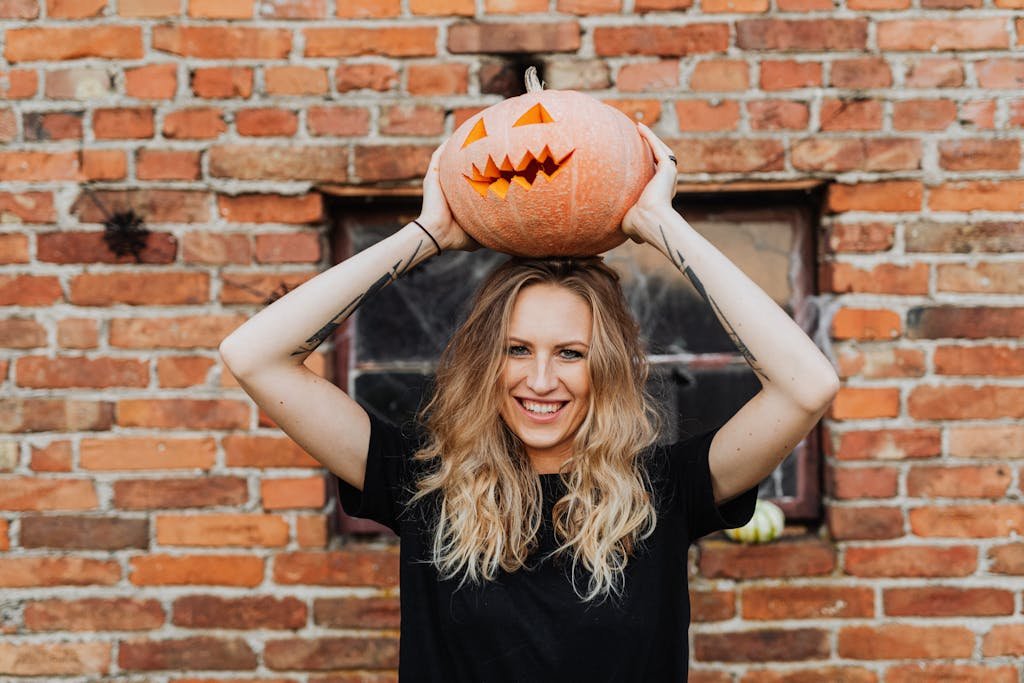 Woman with Pumpkin over Head